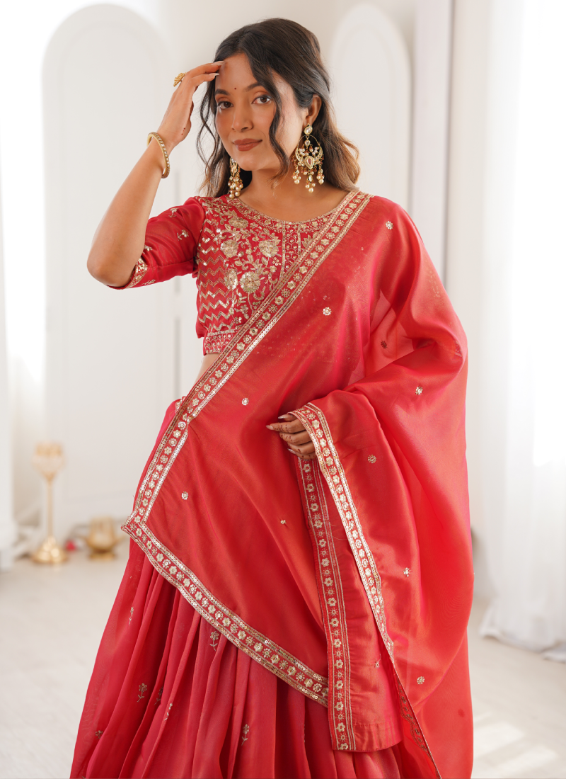 Customary Orange Heavy Embroidered Shimmer Silk Lehenga Choli For Women