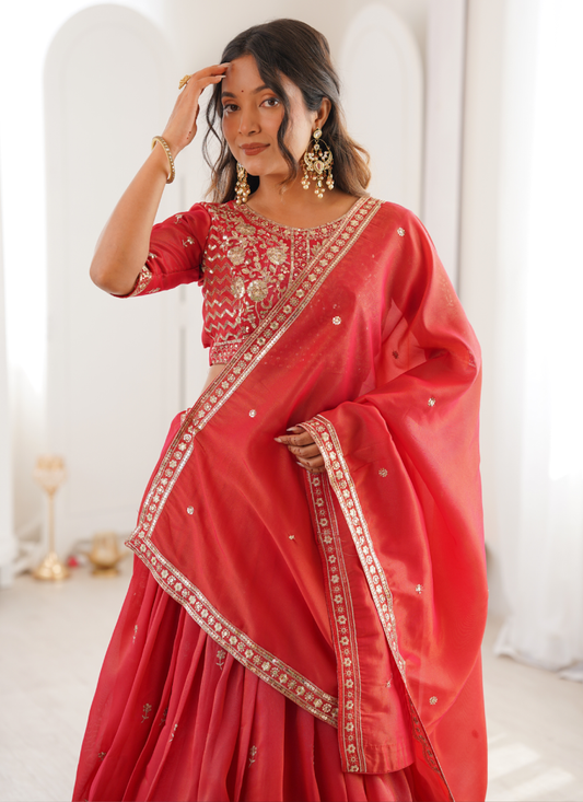 Customary Orange Heavy Embroidered Shimmer Silk Lehenga Choli For Women