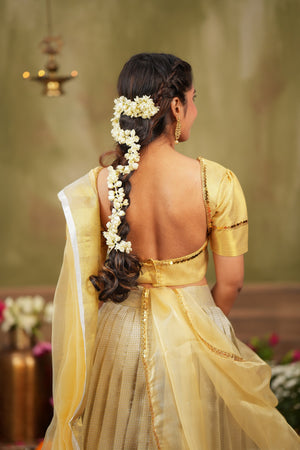 Vishnupriya | Tissue Silk Silver Lehenga Set in Golden For Festive Looks